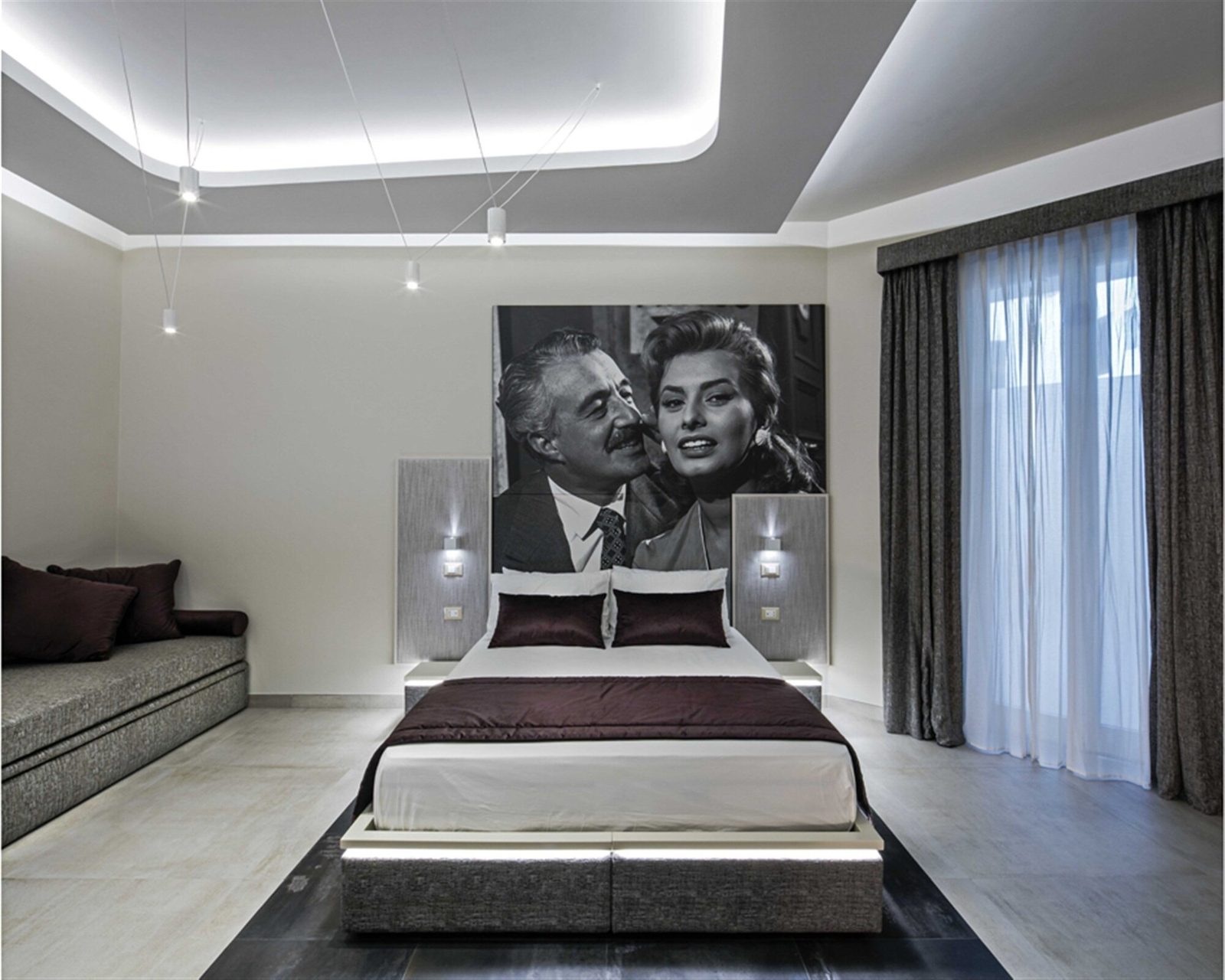 Camera Deluxe, variante A — bed and seating area